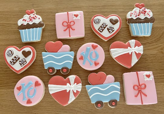  One dozen Individually wrapped Valentine's Day 3 1/2" - 4" cookies.