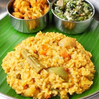 Sambar Rice with one side and Papads